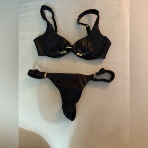 Black leather Agent Provacteur bra and thong set with Gold hardware